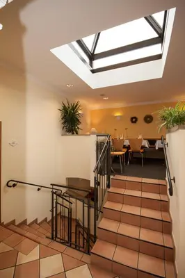 Ein Restaurant oder anderes Speiselokal in der Unterkunft Linde Restaurant & Hotel