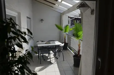 Ein Balkon oder eine Terrasse in der Unterkunft PalmGarden