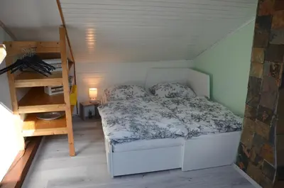 Ein Bett oder Betten in einem Zimmer der Unterkunft PalmGarden