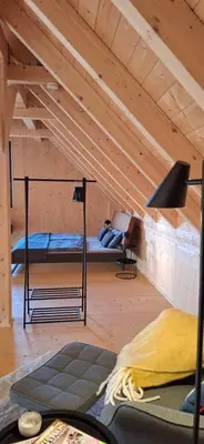 Ein Bett oder Betten in einem Zimmer der Unterkunft Odenwald-Lodge mit Infrarotsauna und E-Ladestation im Naturpark Odenwald 