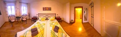 Ein Bett oder Betten in einem Zimmer der Unterkunft Gästehaus Zum Weinbauer