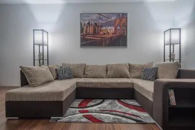Ein Sitzbereich in der Unterkunft Schöne 2 Zimmerwohnung mit UHD-TV, großem Balkon und Hängematte