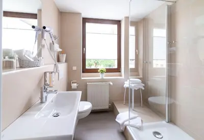 Ein Badezimmer in der Unterkunft Hotel Adler Post