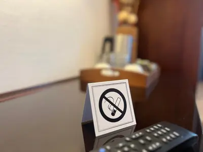 Ein Zertifikat, Auszeichnung, Logo oder anderes Dokument, das in der Unterkunft Central Hotel ausgestellt ist