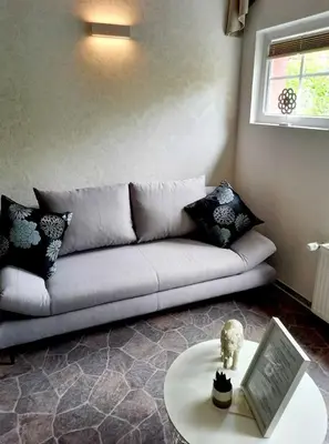 Ein Sitzbereich in der Unterkunft Mümling-Apartment 1