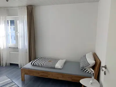 Ein Bett oder Betten in einem Zimmer der Unterkunft Ferienwohnung Birka