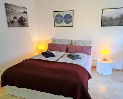 Ein Bett oder Betten in einem Zimmer der Unterkunft Kupferberg - helles und gemütliches Appartement in Uninähe