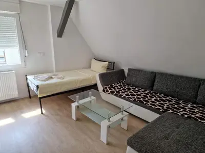 Ein Bett oder Betten in einem Zimmer der Unterkunft Ferienwohnungen Löwe