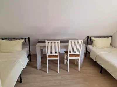Ein Bett oder Betten in einem Zimmer der Unterkunft Ferienwohnungen Löwe