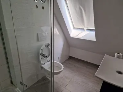 Ein Badezimmer in der Unterkunft Ferienwohnungen Löwe