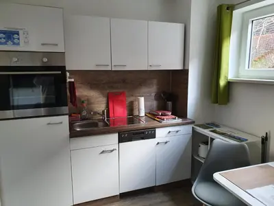 Küche/Küchenzeile in der Unterkunft Ferienwohnung Raiffeisenstraße - Obernburg