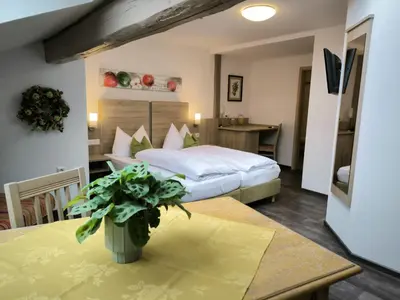 Ein Bett oder Betten in einem Zimmer der Unterkunft Am Treidelpfad