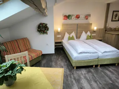 Ein Bett oder Betten in einem Zimmer der Unterkunft Am Treidelpfad