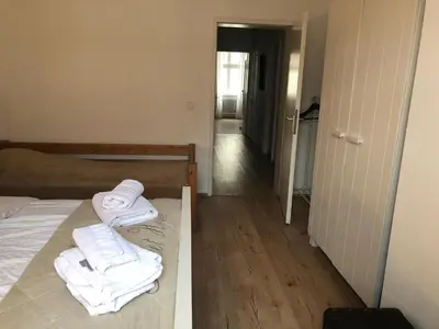 Ein Bett oder Betten in einem Zimmer der Unterkunft Philosophen und Neckarblick Apartment