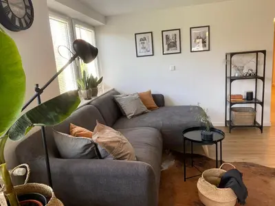 Ein Sitzbereich in der Unterkunft ☆FEWO ALTES KINO - MODERN - QUIET - 65M² - TV - NETFLIX - WLAN☆