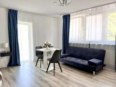 Ein Sitzbereich in der Unterkunft Sophie Superior Apartment
