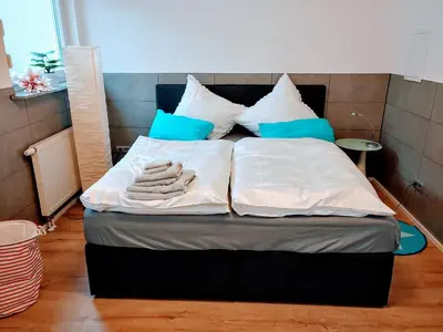 Ein Bett oder Betten in einem Zimmer der Unterkunft Ferienwohnung Familie Schwarz