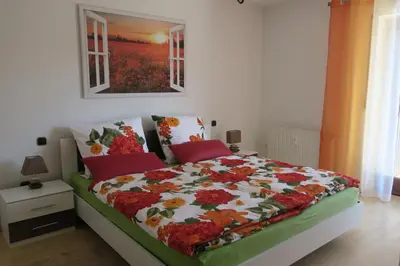 Ein Bett oder Betten in einem Zimmer der Unterkunft Ferienwohnung Fröhlich