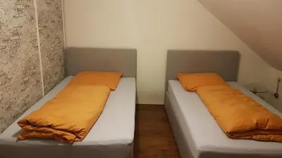 Ein Bett oder Betten in einem Zimmer der Unterkunft Joanna Apartment - MA Rheinau 5