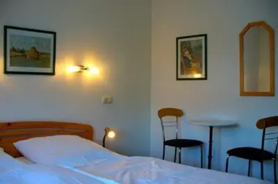 Ein Bett oder Betten in einem Zimmer der Unterkunft Hotel Ernst Ludwig