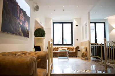 Ein Sitzbereich in der Unterkunft Hotel Heidelberger Hof