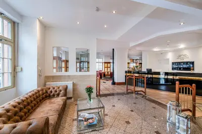 Ein Sitzbereich in der Unterkunft Hotel Heidelberger Hof