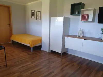 Ein Bett oder Betten in einem Zimmer der Unterkunft Ferienwohnung Haiber - Remseck