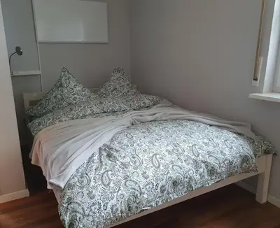 Ein Bett oder Betten in einem Zimmer der Unterkunft Ferienwohnung Haiber - Remseck