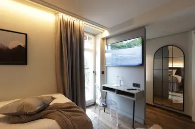 Ein Bett oder Betten in einem Zimmer der Unterkunft REINHARDTs HOTEL