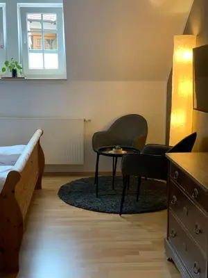 Ein Sitzbereich in der Unterkunft das Eppelsheimer