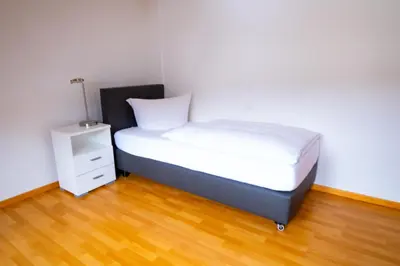 Ein Bett oder Betten in einem Zimmer der Unterkunft Maisonette 1