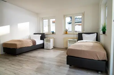 Ein Bett oder Betten in einem Zimmer der Unterkunft Maisonette 1