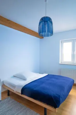 Ein Bett oder Betten in einem Zimmer der Unterkunft Maisonette 1