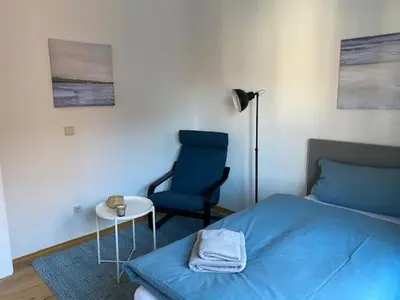 Ein Bett oder Betten in einem Zimmer der Unterkunft Gästehaus Windheim Ettlingen Stadt