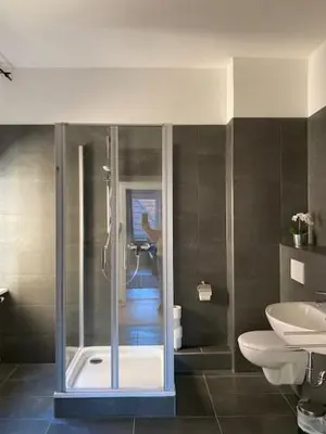 Ein Badezimmer in der Unterkunft Gästehaus Windheim Ettlingen Stadt