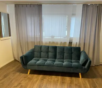 Ein Sitzbereich in der Unterkunft Sophie Deluxe Apartment