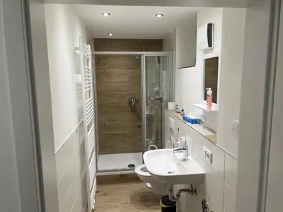 Ein Badezimmer in der Unterkunft Ferienwohnung Raiffeisenstraße -groß-