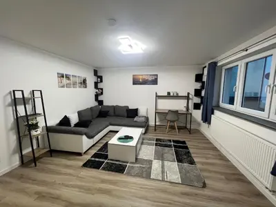 Ein Sitzbereich in der Unterkunft Ferienwohnung Raiffeisenstraße -groß-