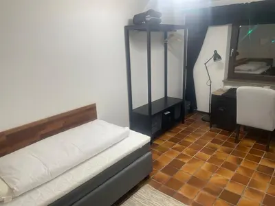 Ein Bett oder Betten in einem Zimmer der Unterkunft Einzigartige Unterkunft mit viel Extras