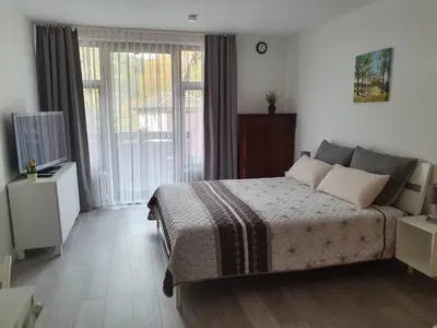 Ein Bett oder Betten in einem Zimmer der Unterkunft Gemütliche Ferienwohnung am Kurpark in Bad Herrenalb