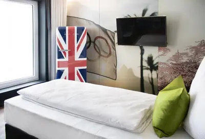 Ein Bett oder Betten in einem Zimmer der Unterkunft PFU Hotel by WMM Hotels