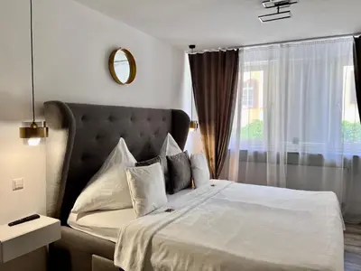 Ein Bett oder Betten in einem Zimmer der Unterkunft Sophie Flair Apartment