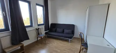 Ein Sitzbereich in der Unterkunft Monteur und Messewohnung
