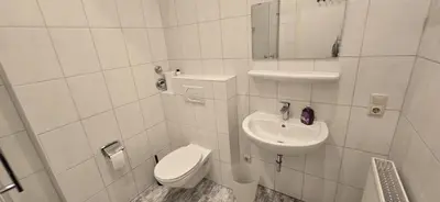 Ein Badezimmer in der Unterkunft Monteur und Messewohnung