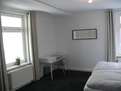 Ein Bett oder Betten in einem Zimmer der Unterkunft Ferienwohnung Speyer