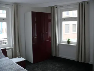 Ein Bett oder Betten in einem Zimmer der Unterkunft Ferienwohnung Speyer