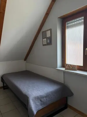 Ein Bett oder Betten in einem Zimmer der Unterkunft FEWO Eggenstein beim KIT