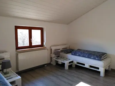 Ein Bett oder Betten in einem Zimmer der Unterkunft Strandurlaub am Felsenmeer