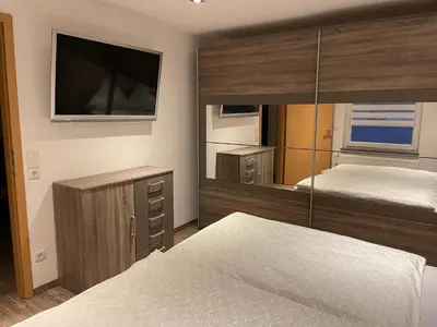 Ein Bett oder Betten in einem Zimmer der Unterkunft Ferienwohnung Jasmin