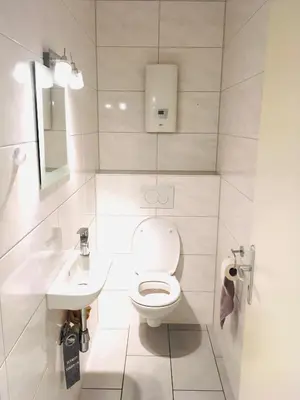 Ein Badezimmer in der Unterkunft Zentrales Wohlfühl Apartment, 10 Min bis Frankfurt HBF